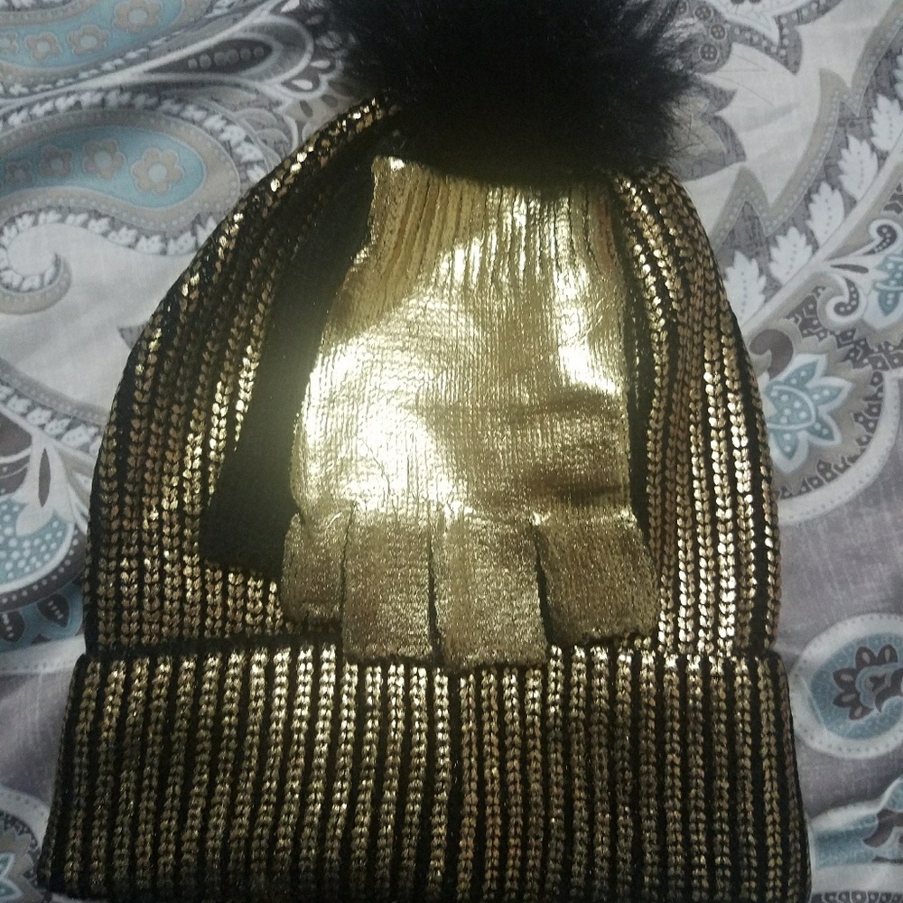 Gold and black hat and gloves